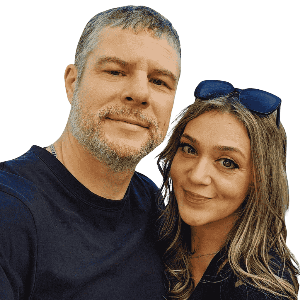 man and woman smile for a photo