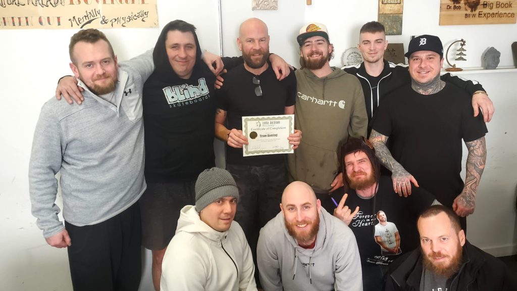 Into Action male addiction treatment center group photo