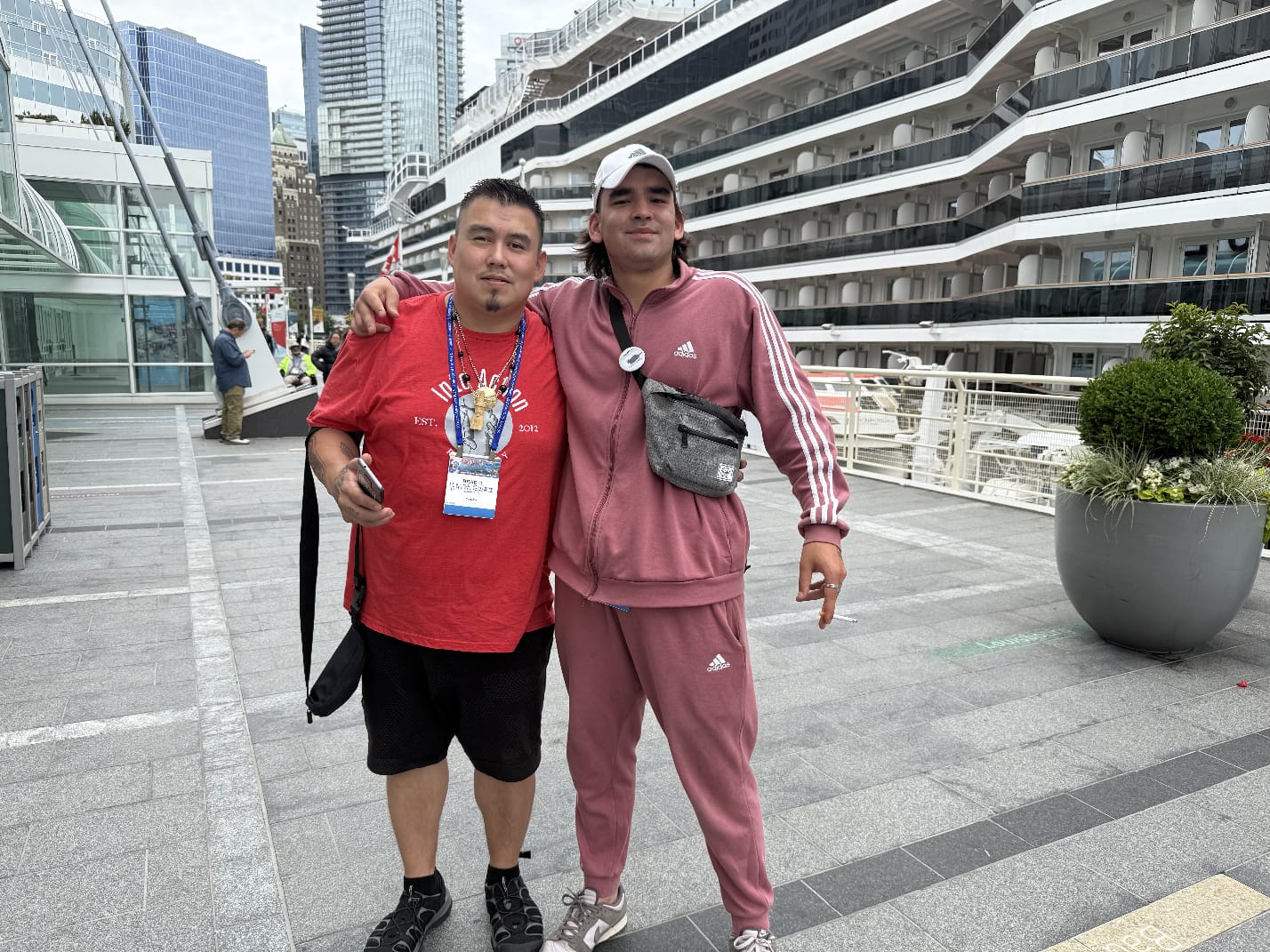 Into Action residential patients pose for a photo by the harbor