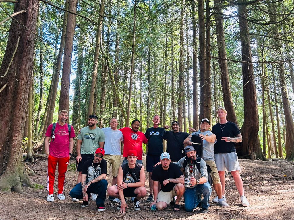 group photo of Into Action outside on a hiking trip
