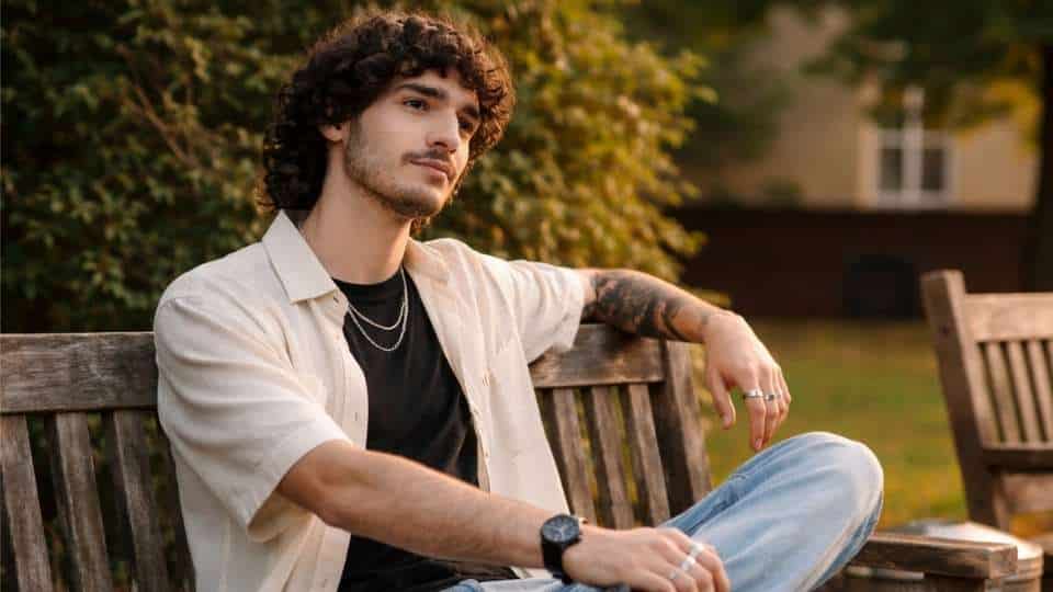 Brain Recovery From Alcohol Timeline a man stares out into the distance contemplating his brain health.