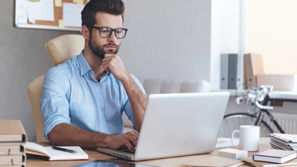 Can You Work While in IOP a man works at his job while attending IOP during certain hours.